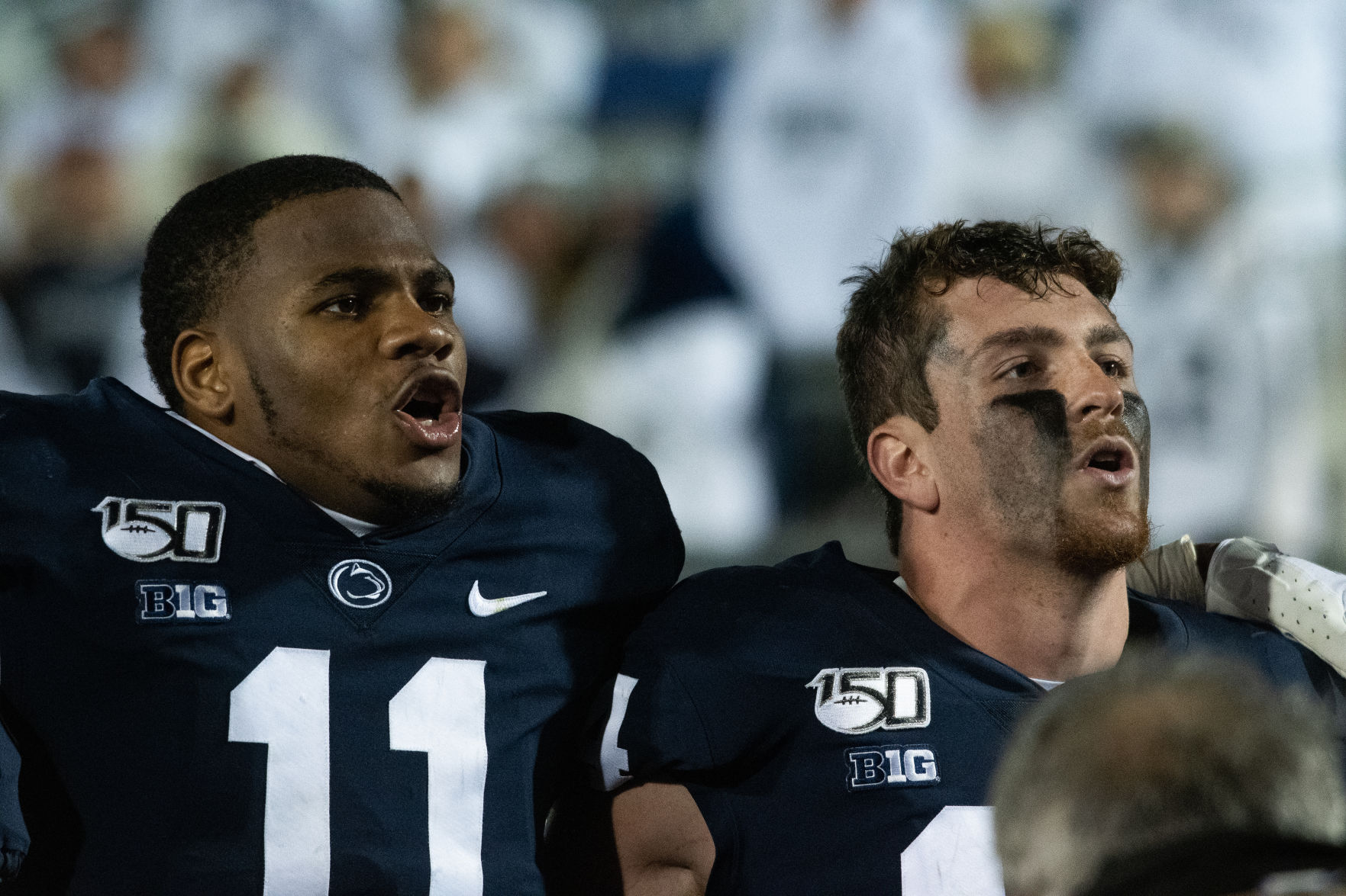 Penn State vs Michigan, Micah Parsons (11) and Sean Clifford (14)